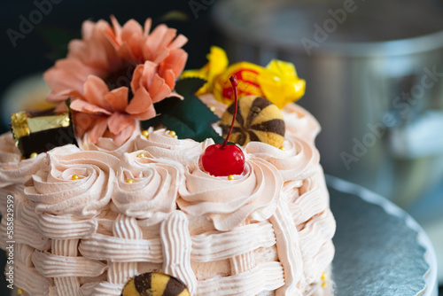 Basket-shaped cake with sweets, cookies and flowers,Easter marks the end of Holy Week