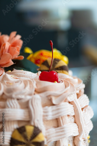 Basket-shaped cake with sweets, cookies and flowers,Easter marks the end of Holy Week