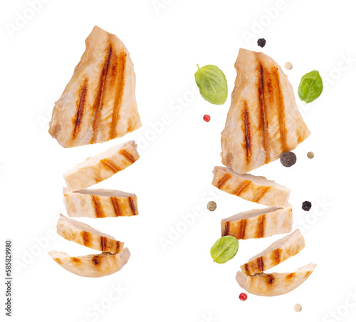 Grilled chicken breast isolated on transparent background png. Grilled chicken slices with pepper mix peas and fresh basil leaves. flying food