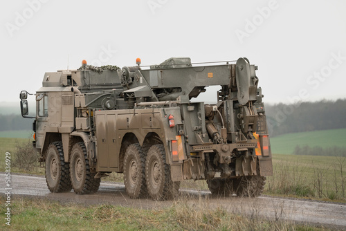 British army MAN SVR (Support Vehicle Recovery) 8x8 in motion on a dirt track
