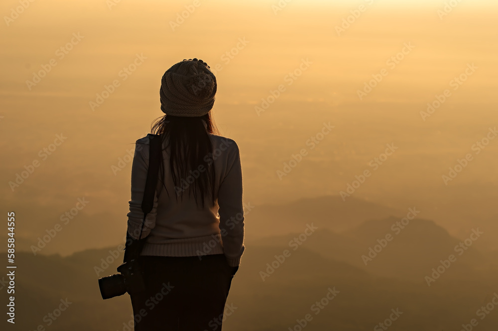 Silhouette of photographer taking picture of landscape during sunset Silhouette of photographer taking picture of landscape during sunset