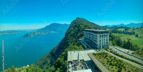 Panoramic View over Hotel Palace and Lake Lucerne and Mountain in a Sunny Summer Day in Burgenstock, Nidwalden, Switzerland.