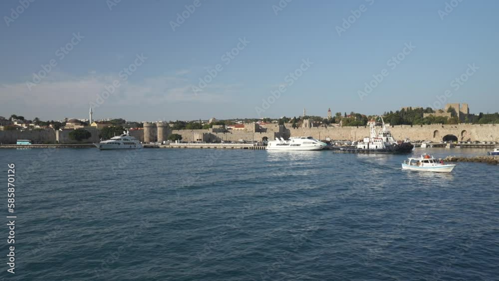 Rhodes Town from ferry leaving port, Rhodes Old Town, Rhodes, Dodecanese Islands, Greek Islands, Greece, Europe Rhodes Town from ferry leaving port, Rhodes Old Town, Rhodes, Dodecanese Islands, Greek Islands, Greece, Europe