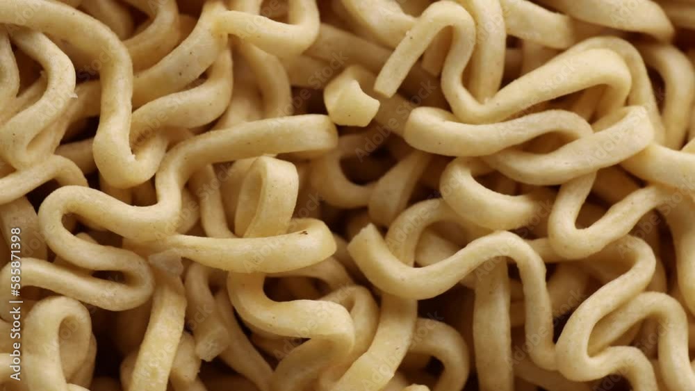 Instant noodles, rotation in circle. dry instant noodles Macro. fast food Instant noodles, rotation in circle. dry instant noodles Macro. fast food