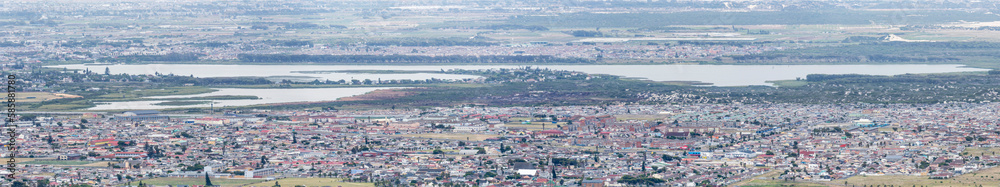 aerial cityscape with Zeekoevlei lakes and southern neighborhoods, from Silver Mine, Cape Town