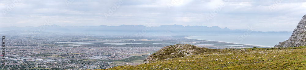 aerial cityscape with southern neighborhoods on False Bay, from Silver Mine, Cape Town