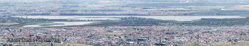 aerial cityscape with Zeekoevlei lakes and southern neighborhoods, from Silver Mine, Cape Town