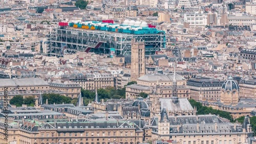 Top view of Paris skyline from above timelapse. Main landmarks of european megapolis with domes and spires. Bird-eye view from observation deck of Montparnasse tower. Paris, France photo