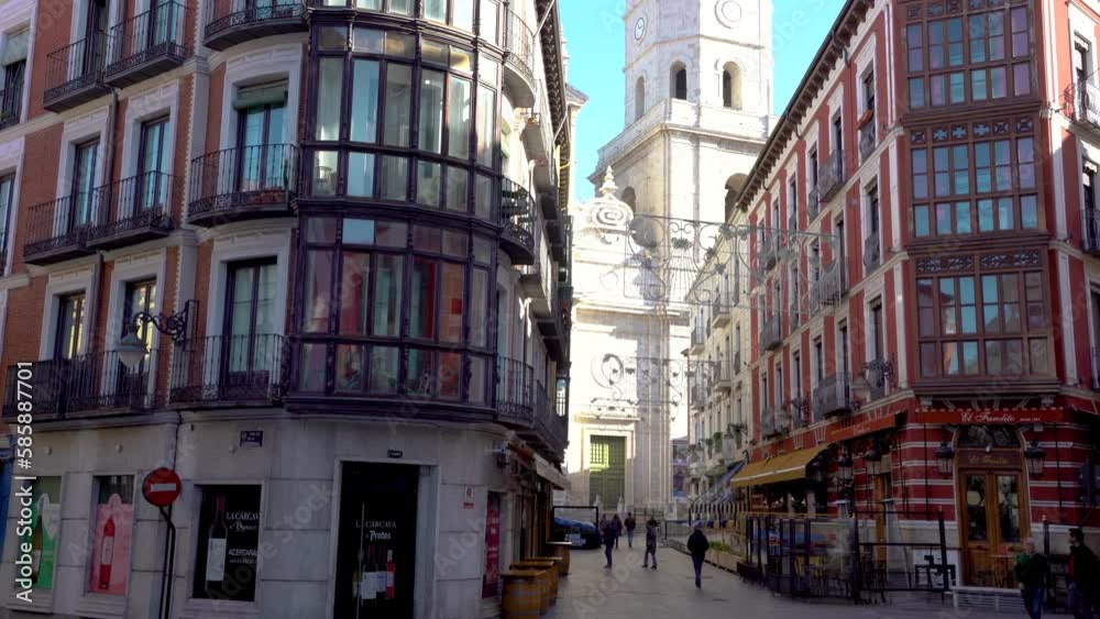Valladolid, Spain - November 12 2022: Spectacular city center of Valladolid with beautiful architecture style and colourful buildings. Cathedral tower in background. Stabilized video, tilt down Valladolid, Spain - November 12 2022: Spectacular city center of Valladolid with beautiful architecture style and colourful buildings. Cathedral tower in background. Stabilized video, tilt down
