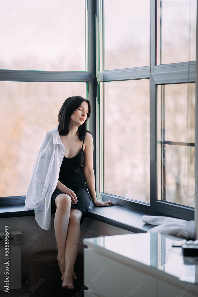 Portrait of a girl sitting near the window 4558. Portrait of a girl sitting near the window 4558.