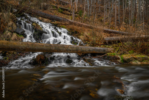 Karlova Studanka waterfall in Jeseniky mountains in spring morning