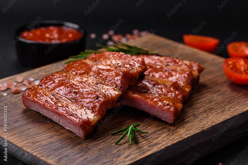 Delicious fresh grilled or smoked ribs with salt, spices and herbs