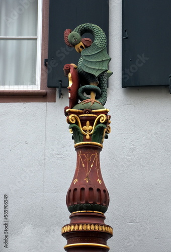 Drachenbrunnen in der Altstadt in Basel photo