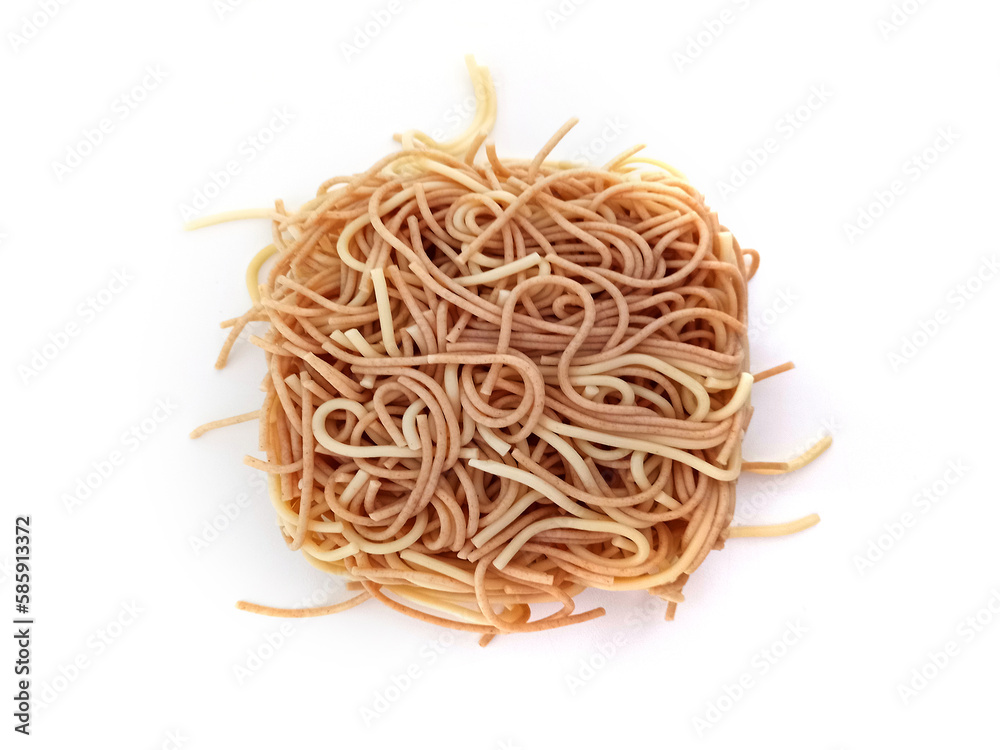 Aerial view of Chinese Egg Noodles on white background. Close up of Spaghettis. Nutrition and Food. Fried noodle strand pack isolated. Aerial view of Chinese Egg Noodles on white background. Close up of Spaghettis. Nutrition and Food. Fried noodle strand pack isolated.