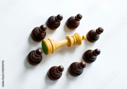 Chess figures on white background.