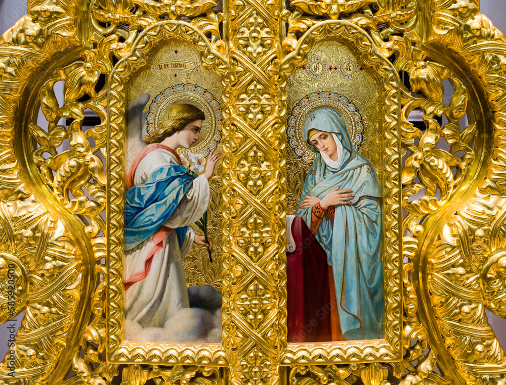 Hand-painted icon of the Annunciation in the golden iconostasis of the Orthodox Church