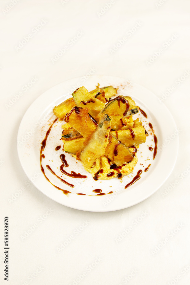 Tempura refers to the typical Japanese quick frying, especially seafood and vegetables, which was the result of the Portuguese in the 16th century