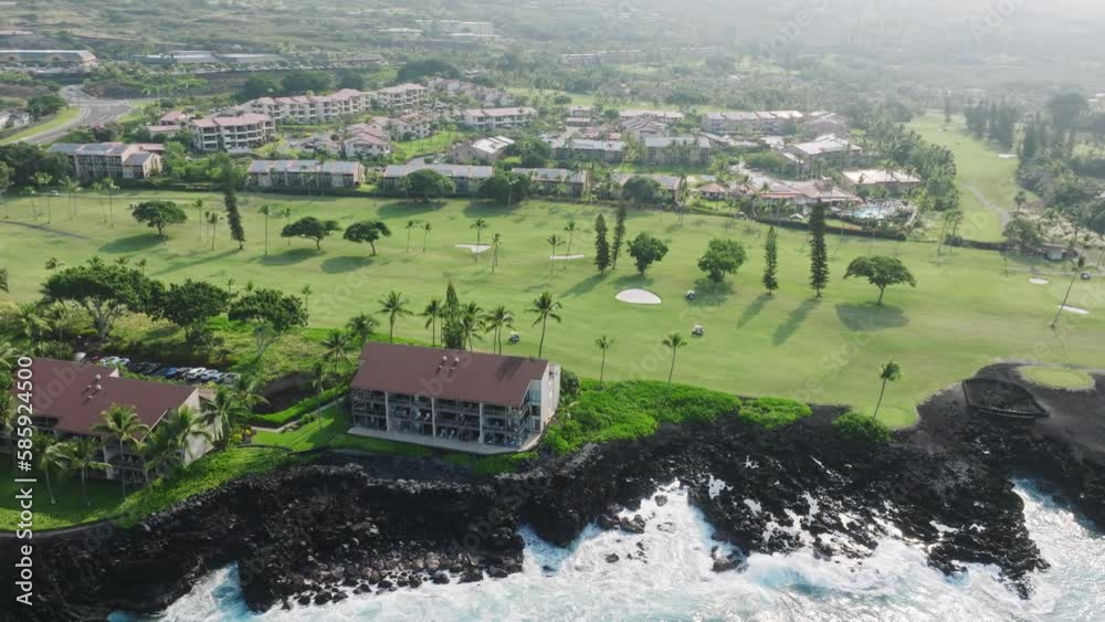 Epic view of expensive summer vacation houses with ocean and green golf