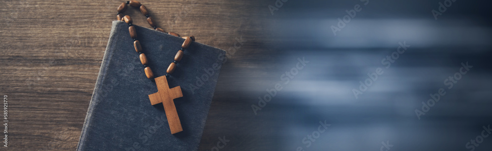 wooden cross on the Bible wooden cross on the Bible