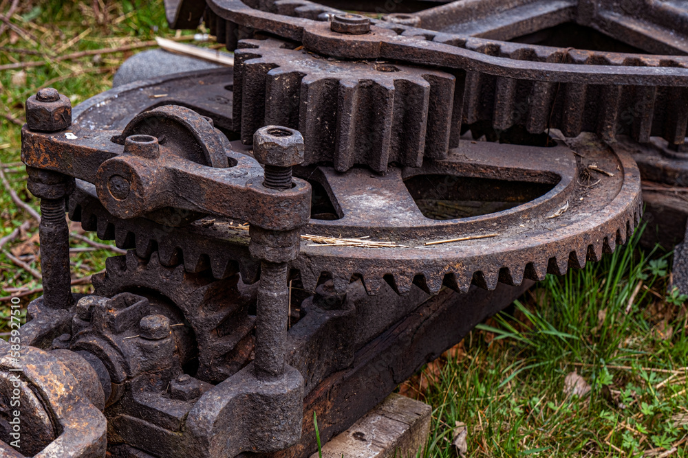 old mechanism a part of the machine with rusty gears old mechanism a part of the machine with rusty gears