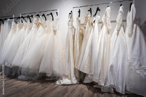 Collection of wedding dresses in the shop © Luca