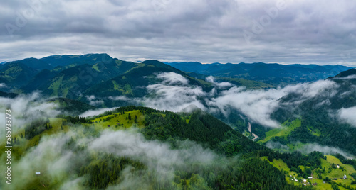 Peaceful scene of misty mountains. Location place of Carpathians mountains, Ukraine, Europe. Photo wallpaper. Aerial photography, top view drone shot. © Ryzhkov Oleksandr