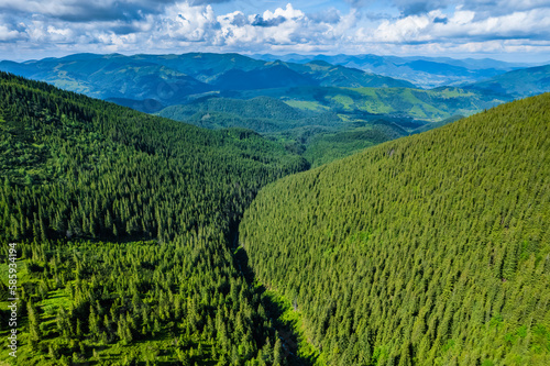 Peaceful scene of misty mountains. Location place of Carpathians mountains, Ukraine, Europe. Photo wallpaper. Aerial photography, top view drone shot.