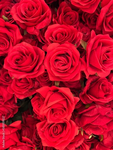 bright artificial rose flowers with petals close-up
