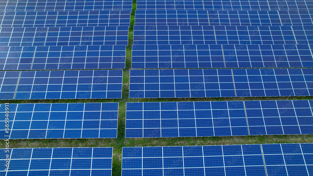 AERIAL: Lined up numerous solar panels for effective production of electricity AERIAL: Lined up numerous solar panels for effective production of electricity
