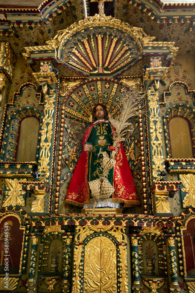 HUANCAVELICA, PERU - APRIL 16, 2022: San Juan Evangelista. Religious sculpture found in the church of Ascension - Huancavelica.