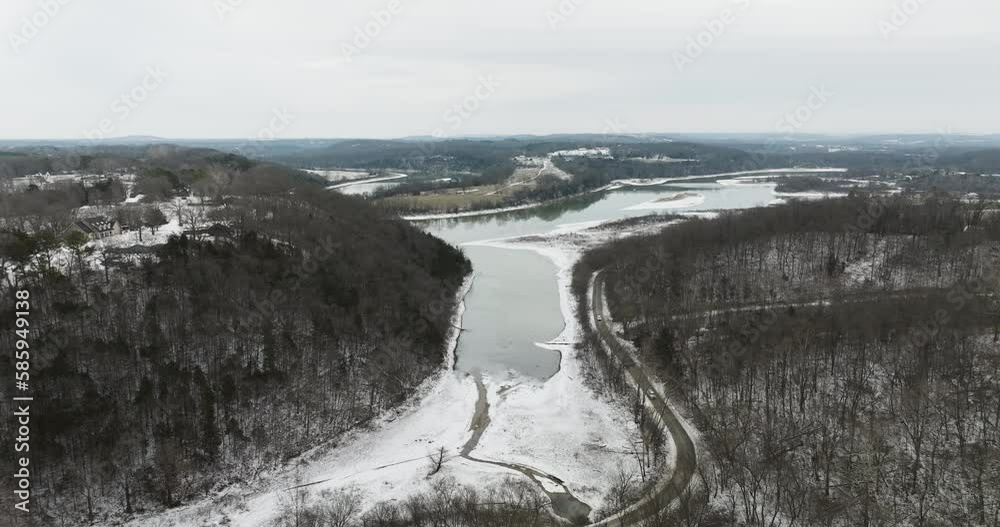 Aerial View Of White River Partly Covered With Ice And Snow During Winter In Fayetteville, Arkansas, USA. Aerial View Of White River Partly Covered With Ice And Snow During Winter In Fayetteville, Arkansas, USA.