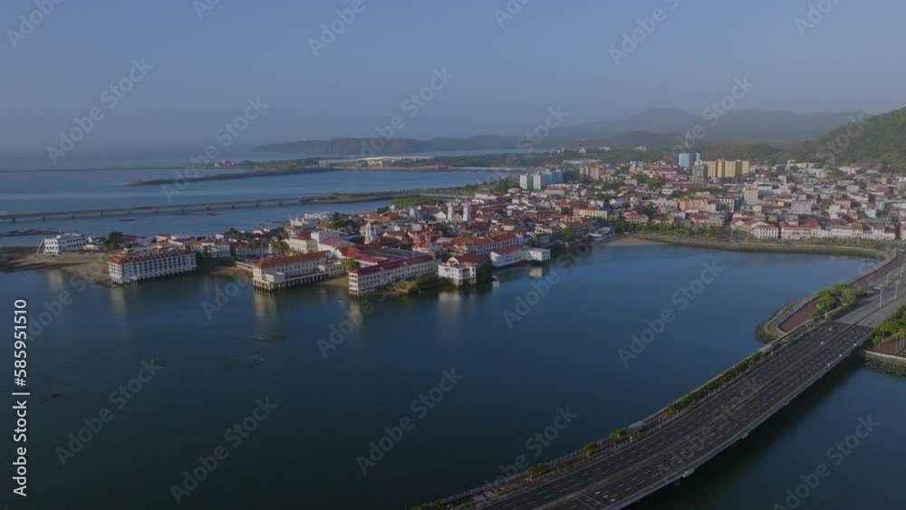 Drone shot of Panama City backtracking Casco Viejo old town over a road in the middle of the Pacific Ocean Drone shot of Panama City backtracking Casco Viejo old town over a road in the middle of the Pacific Ocean