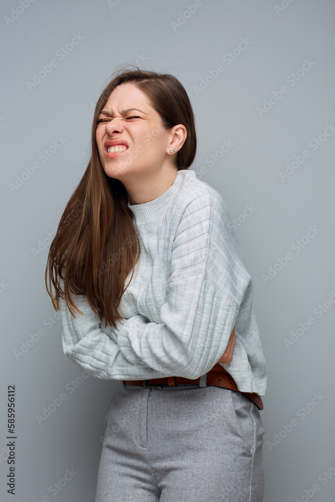 Period or stomach pain. Woman isolated portrait.