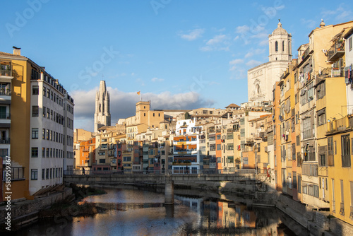 A view of the Riu Onyar in Girona Spain with the Cathedral of Girona in the background photo