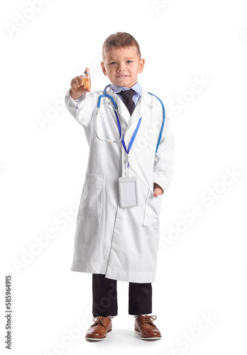 Cute little doctor with vac...
