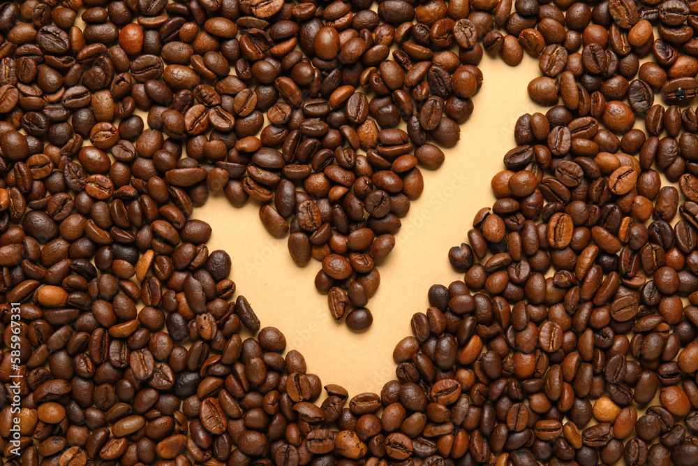 Check mark made of coffee beans on beige background Check mark made of coffee beans on beige background