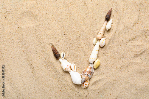 Check mark made of seashell...