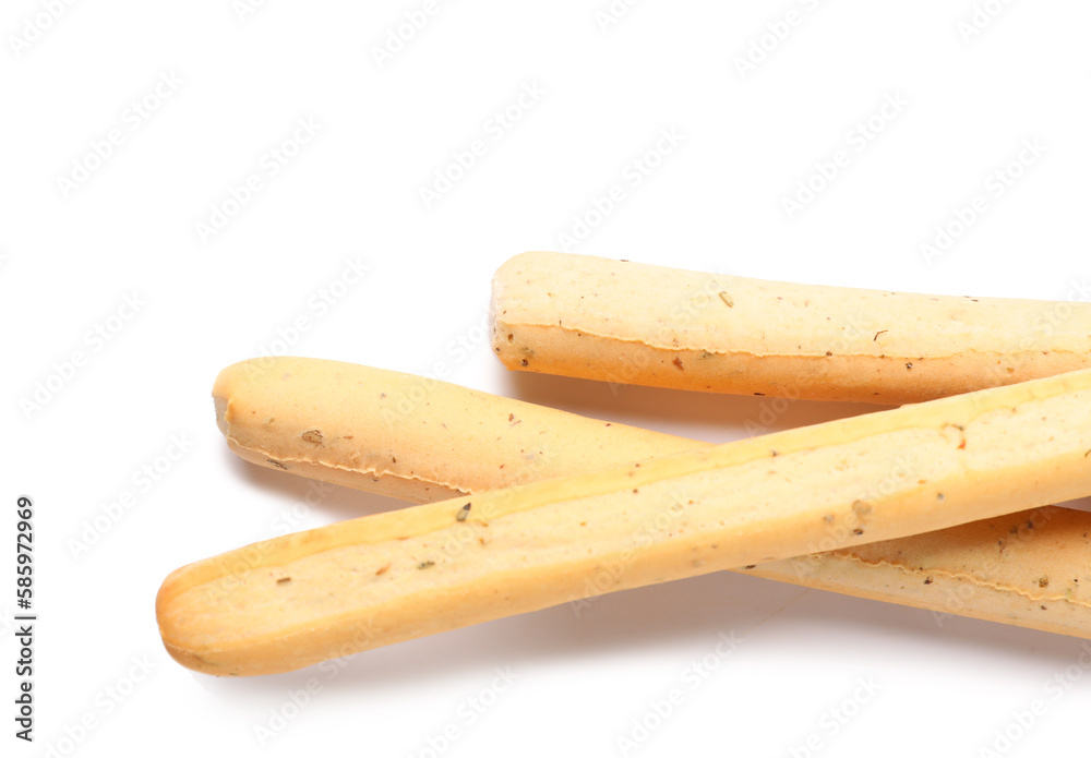 Tasty Italian Grissini on white background, closeup