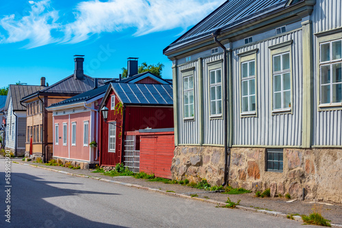 Colorful timber houses in Neristan district of Finnish town Kokkola photo