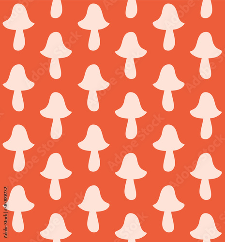 Vector seamless pattern of retro groovy mushroom silhouette isolated on orange background