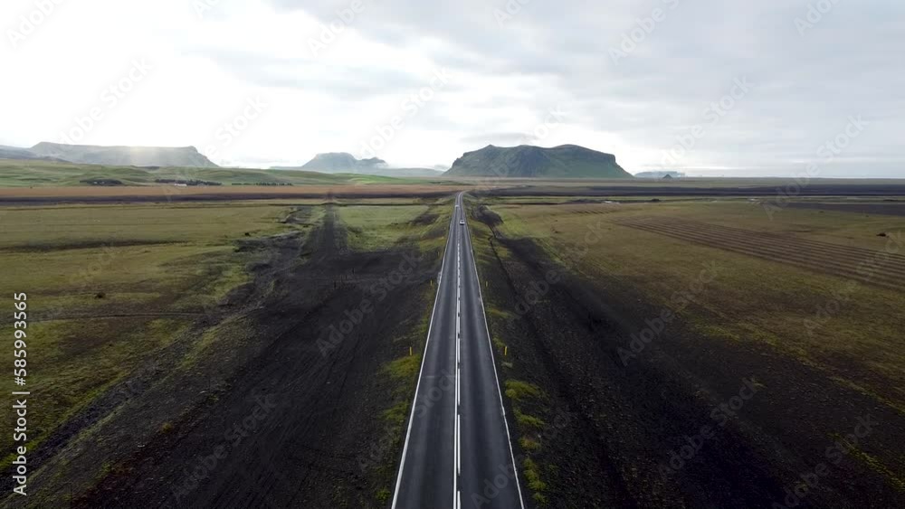 Slow drone shot over the seemingly endless Ring Road in the middle of a rural landscape in Iceland Slow drone shot over the seemingly endless Ring Road in the middle of a rural landscape in Iceland