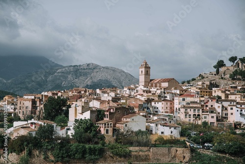 Cityscape of La Nucia in Valencian Community, Spain with mountains in the background photo