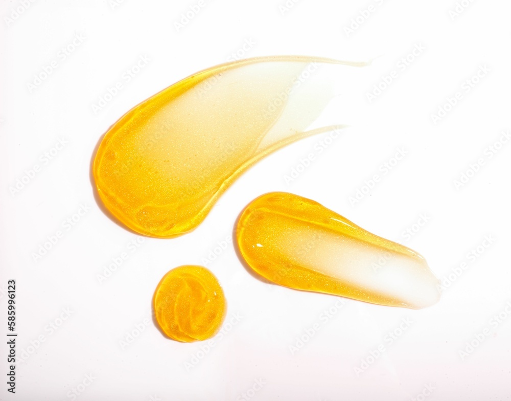 Gold skincare textures on a white background Gold skincare textures on a white background