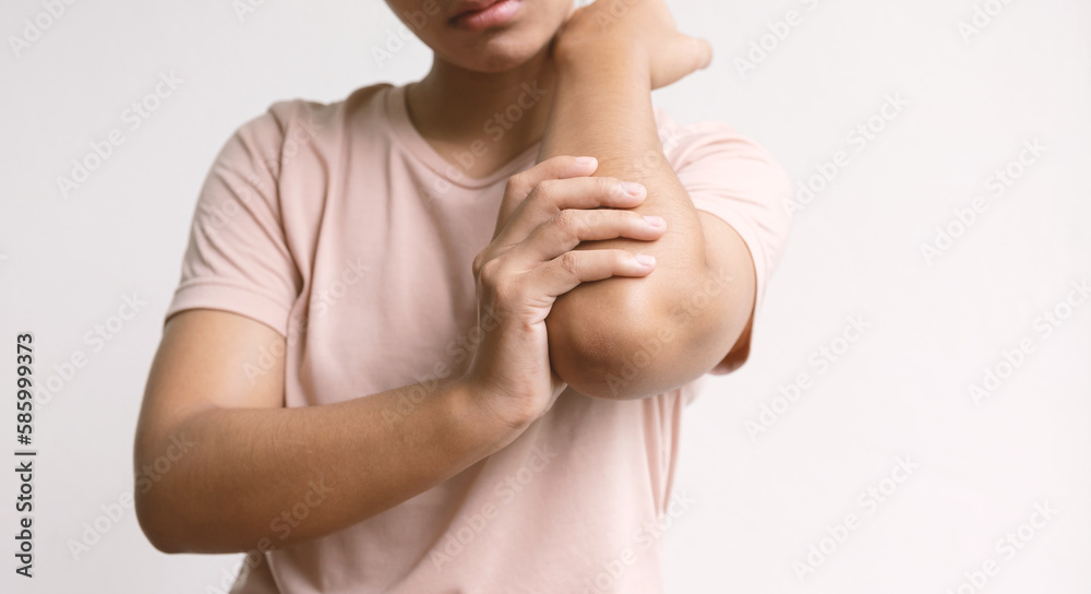 Woman hand massage physiotherapy elbow is sore and numb, exhausted