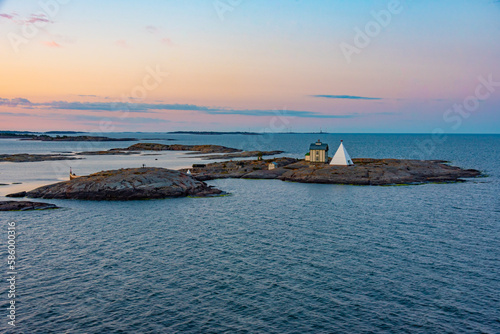 Canvas Print Sunrise over Kobba Klintar pilot station at Aland islands in Finland