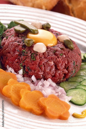 Steak Tartare with ground raw meat, pikles, onion and egg