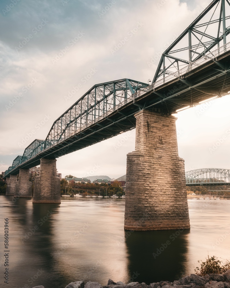 Vertical shot of Walnut Street Bridge under cloudy sky in Chattanooga, Tennessee, USA Vertical shot of Walnut Street Bridge under cloudy sky in Chattanooga, Tennessee, USA