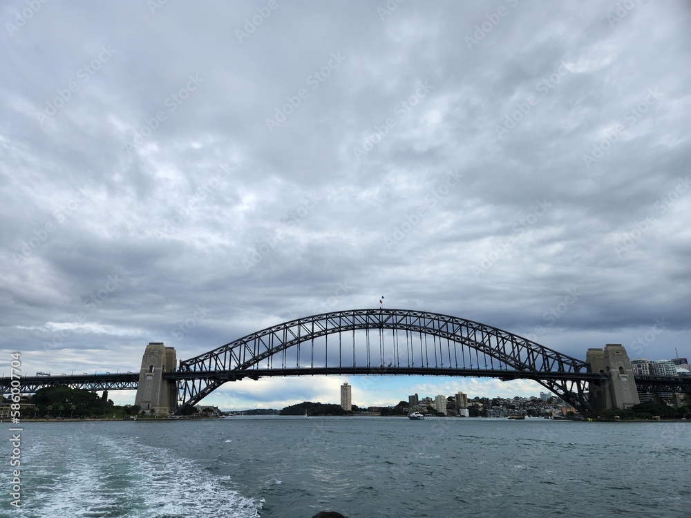 Sydney harbour bridge covered in clouds