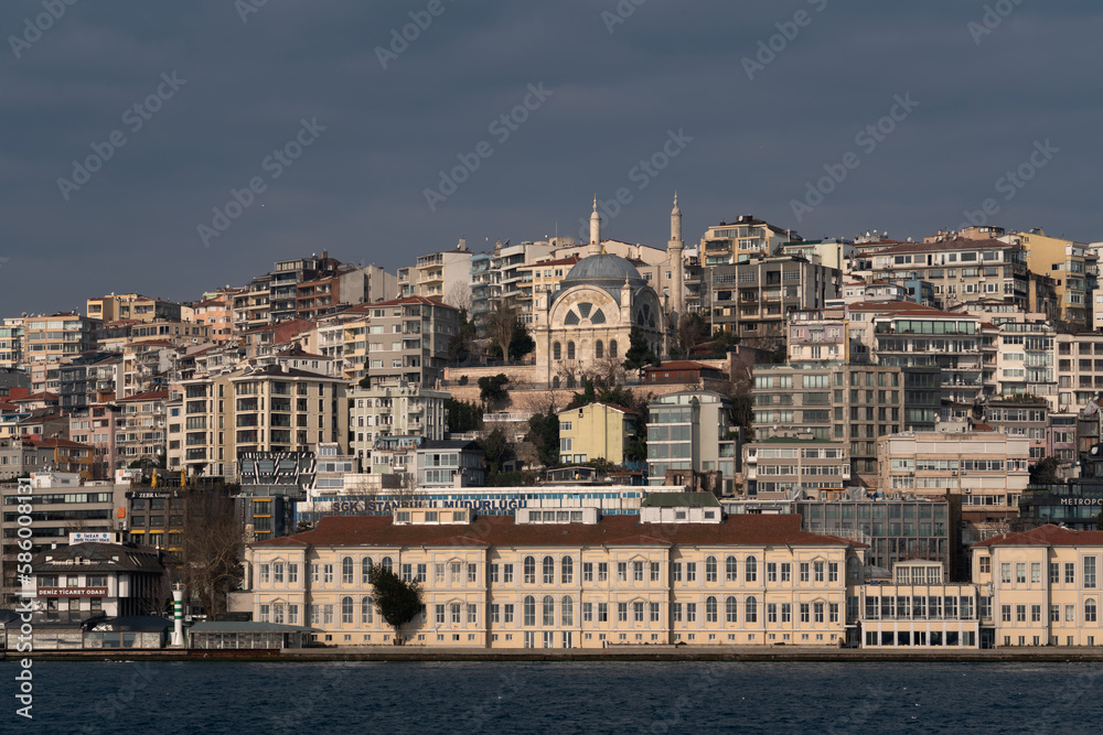 View of the Jihangir microdistrict of Beyoglu district in the European part of Istanbul from the water area of the Bosphorus on a sunny day, Istanbul, Turkey