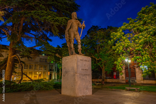 Night view of statue of King Felipe II in Valladolid, Spain photo